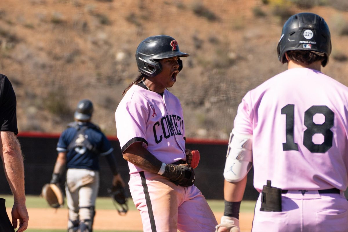 Outfielder #3 Justin Tucker after scoring a run against San Diego Mesa College on May 8.
