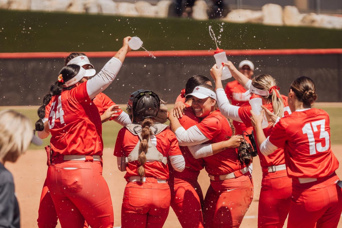 Palomar softball team celebrates after defeating Cerritos College and advancing to the state playoffs.