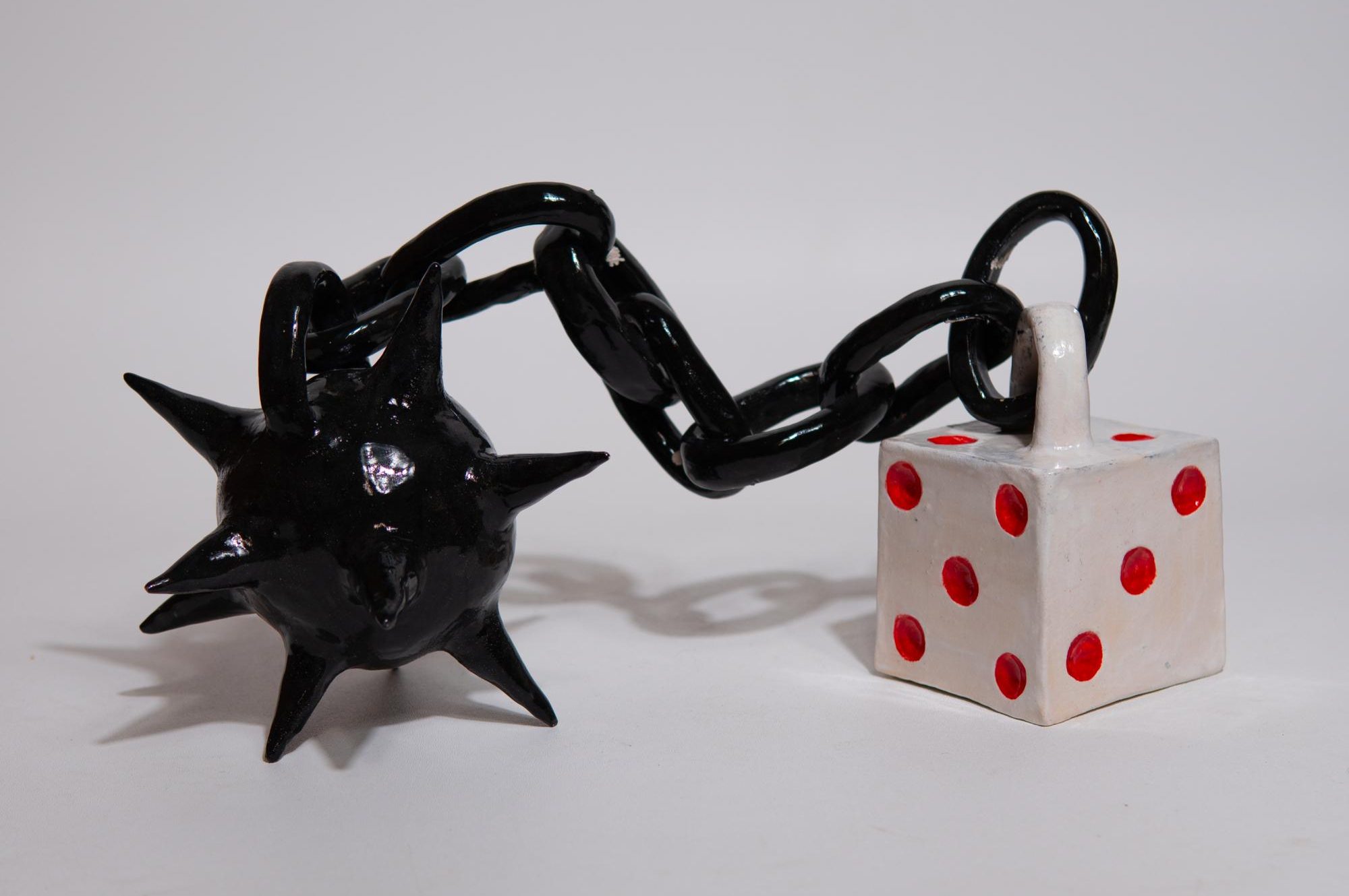 Life’s a Gamble by Jade Lau,
Ceramic
10” x 20” 