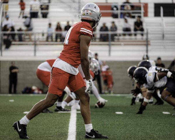 Palomar College's Micah Johnson (#81), wearing a red uniform and silver helmet, lines up in the second quarter against San Diego Mesa College on Sept. 20, 2025 at Palomar College Stadium.
