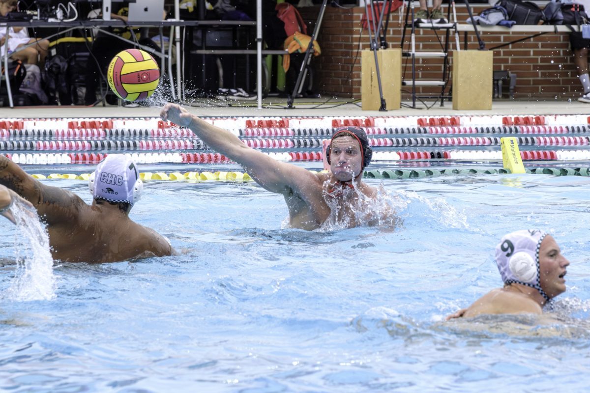 Palomar College’s Kaelin Kelly (#8) throws the ball by defender Luke Quintana (#7) of Crafton Hills College