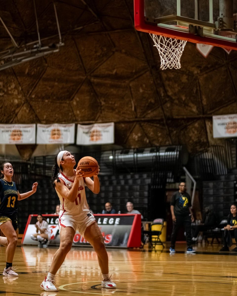 Palomar College guard Luciana Aguilar (#11) scoring a layup after a breakaway from Allen Hancock guard Moncerat Campos (#13)in the first quarter on Nov. 14 2025 at the Dome.