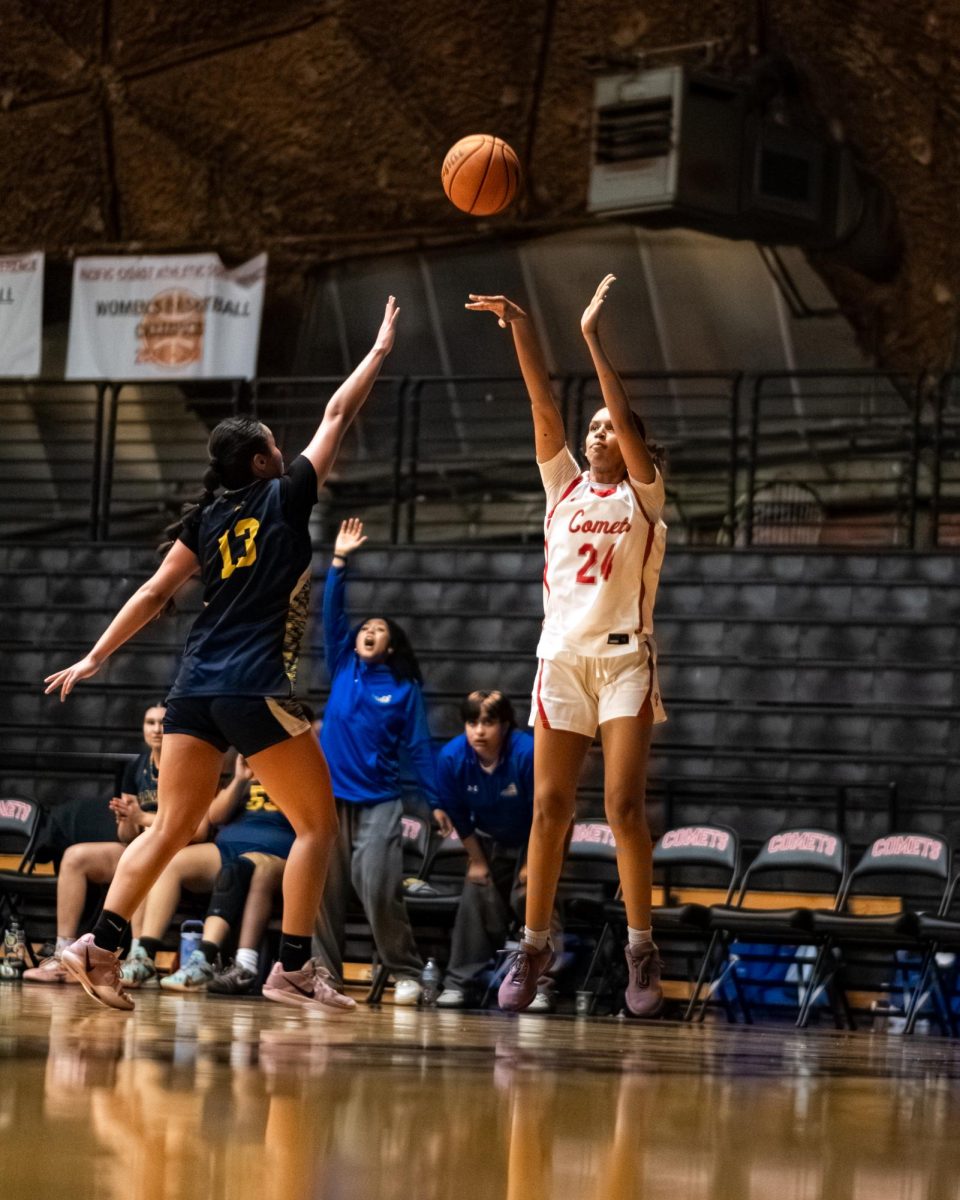 Palomar College guard Ivorii Seals (#24) shoots from deep against Allen Hancock guard Moncerat Campos (#13) in the second quarter on Nov. 14 2025 at the Dome.
