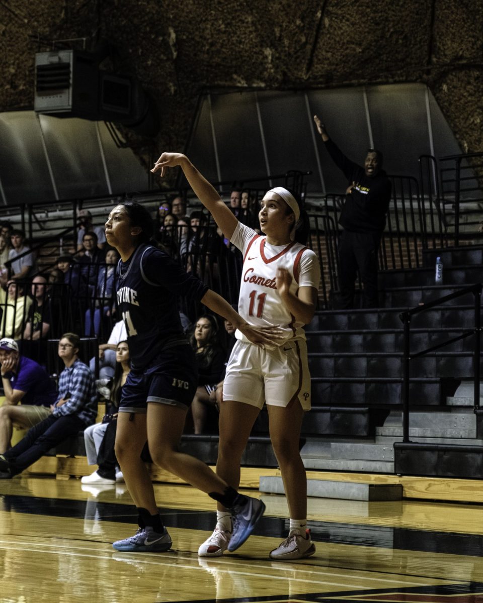 Palomar College guard Luciana Aguilar (#11) watches her shot fall as Irvine Valley College forward Alexis Price (#21) on Nov. 1, 2025, at The Dome.
