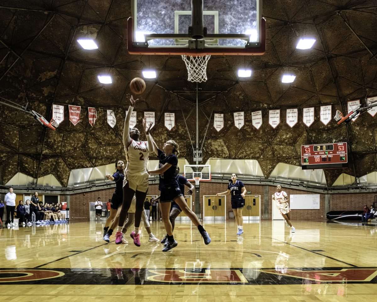 Palomar College forward Kailani Flournoy (#2) is contesting against Irvine Valley College guard Dorothy Schwenck (#22) in the paint at the end of regulation on Nov. 1 2025 at The Dome. 