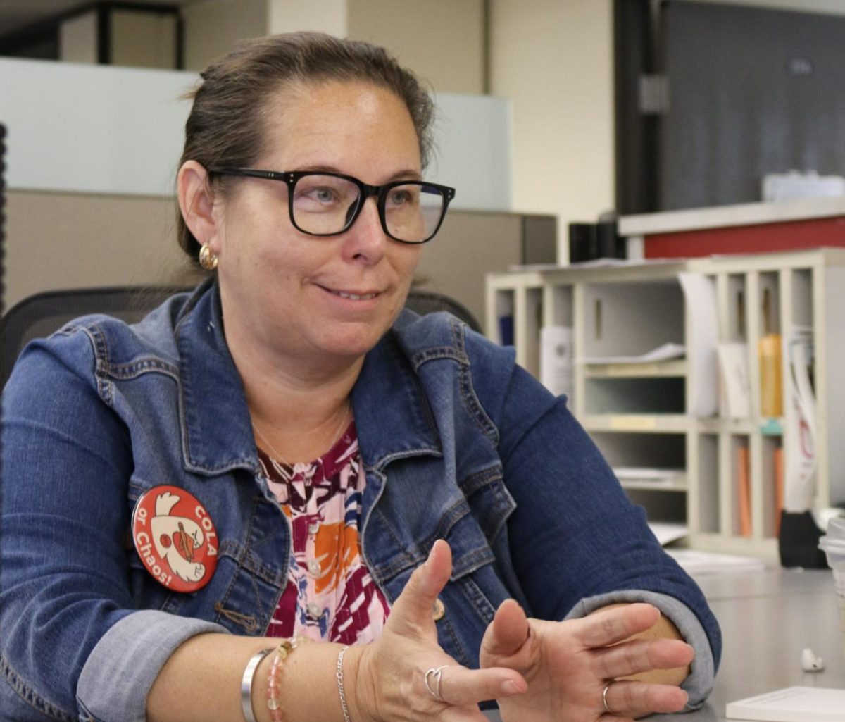 Angie Martinez-Heffner, financial aid specialist.  

