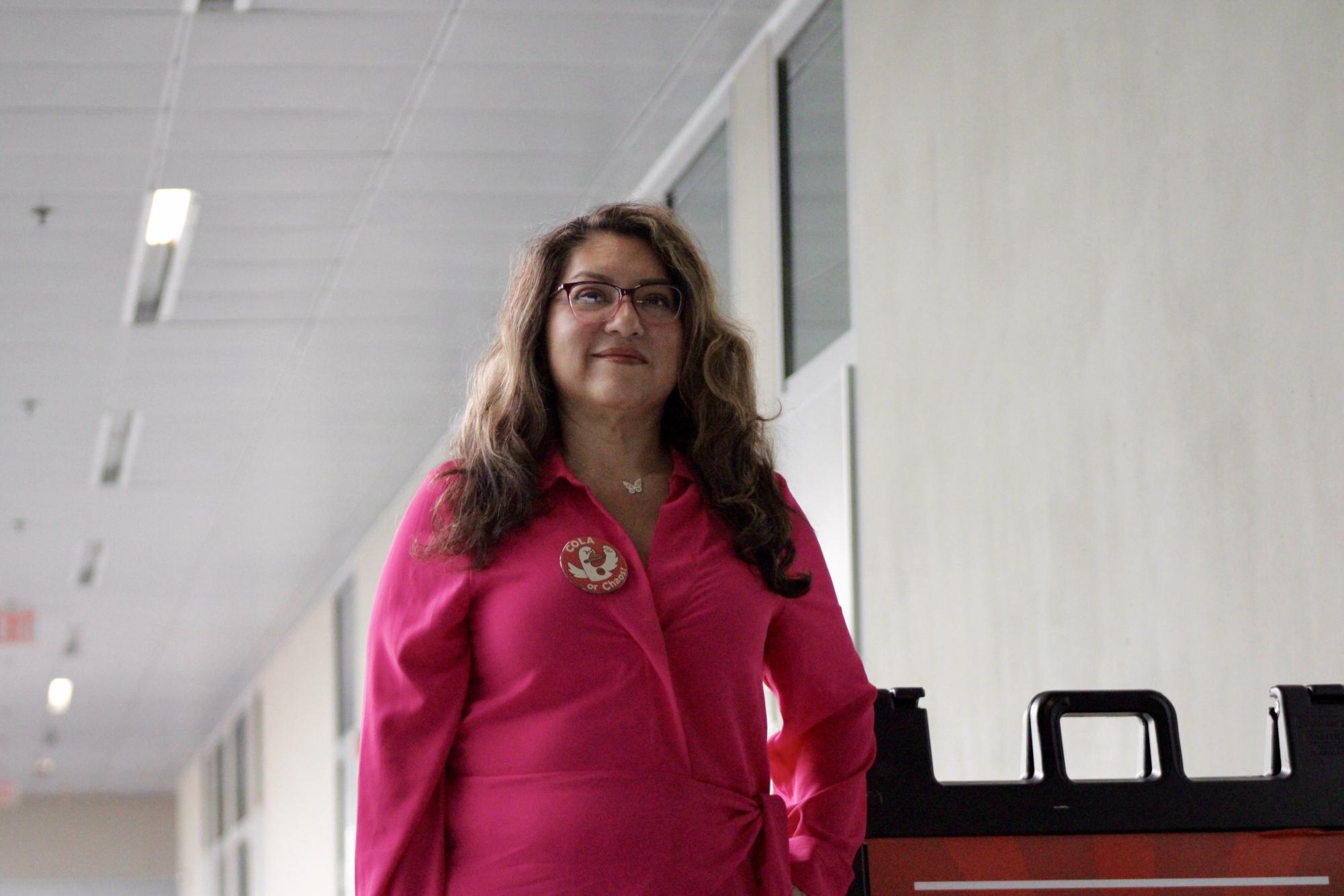 Anel Gonzalez wears her cost-of-living adjustment pin featuring a goose as the union mascot.