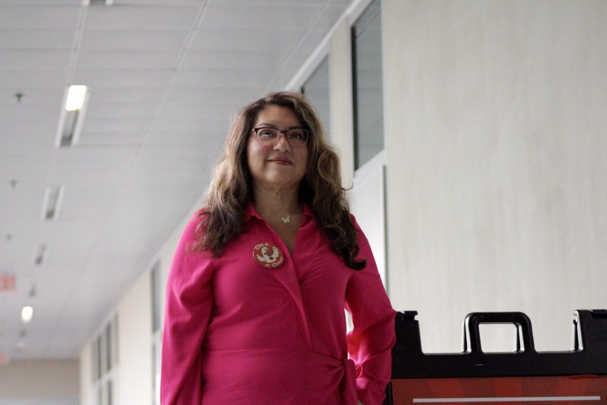 Anel Gonzalez wears her cost-of-living adjustment pin featuring a goose as the union mascot.