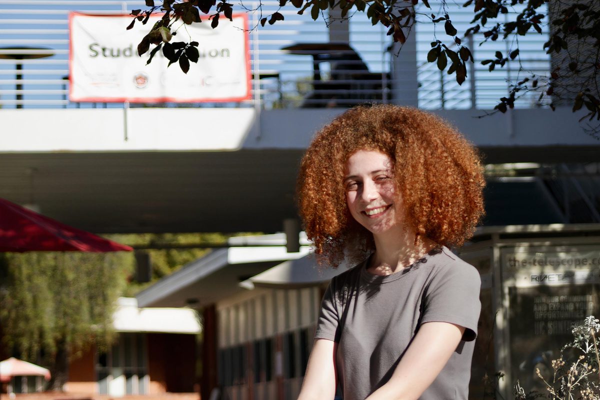 Student Trustee Ariel Fridman in front of the student union on campus.