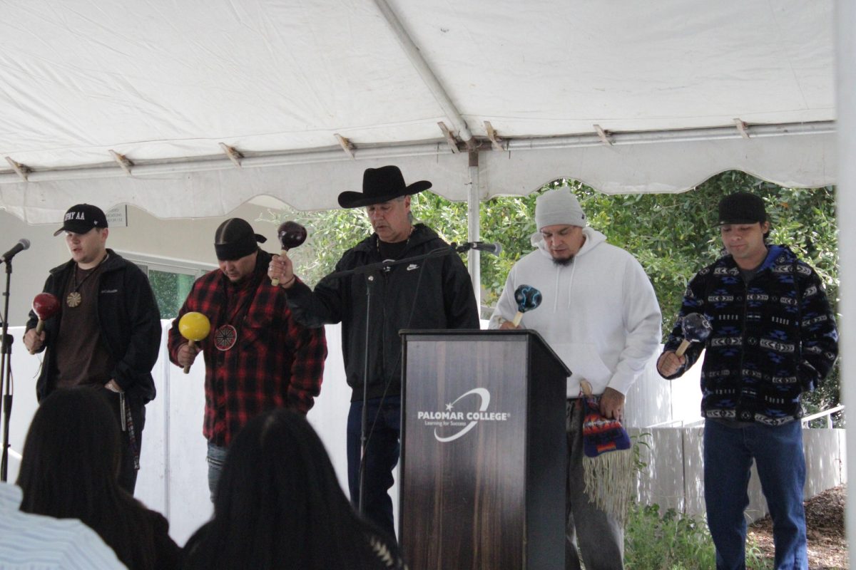 Final Bird Singer Group (facing stage, left to right) - Nicholas Smith, Jacob Alvarado, Jamie LaBrake, Blue Eagle Vigil, and Dakota Jacome