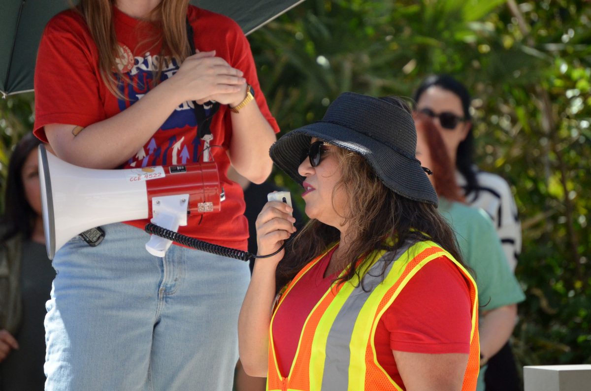 Anel Gonzalez, president of the Classified Counsel of Employees, shares her voice at the "March in March" rally on March 12, 2026 at the Palomar College San Marcos Campus. 