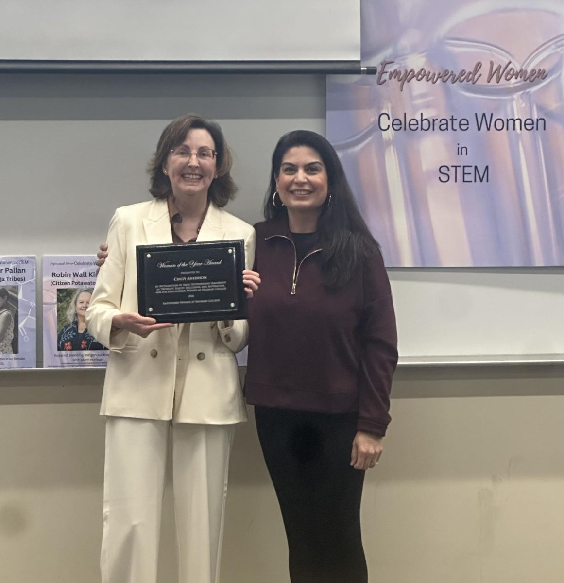 Cynthia Anfinson (left) receives her Woman of the Year award at the Women's History Month Festival on March 10, 2025 at Palomar College.