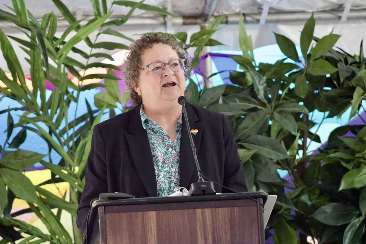 Abbie Cory gives a speech at the grand opening event of the Pride Center