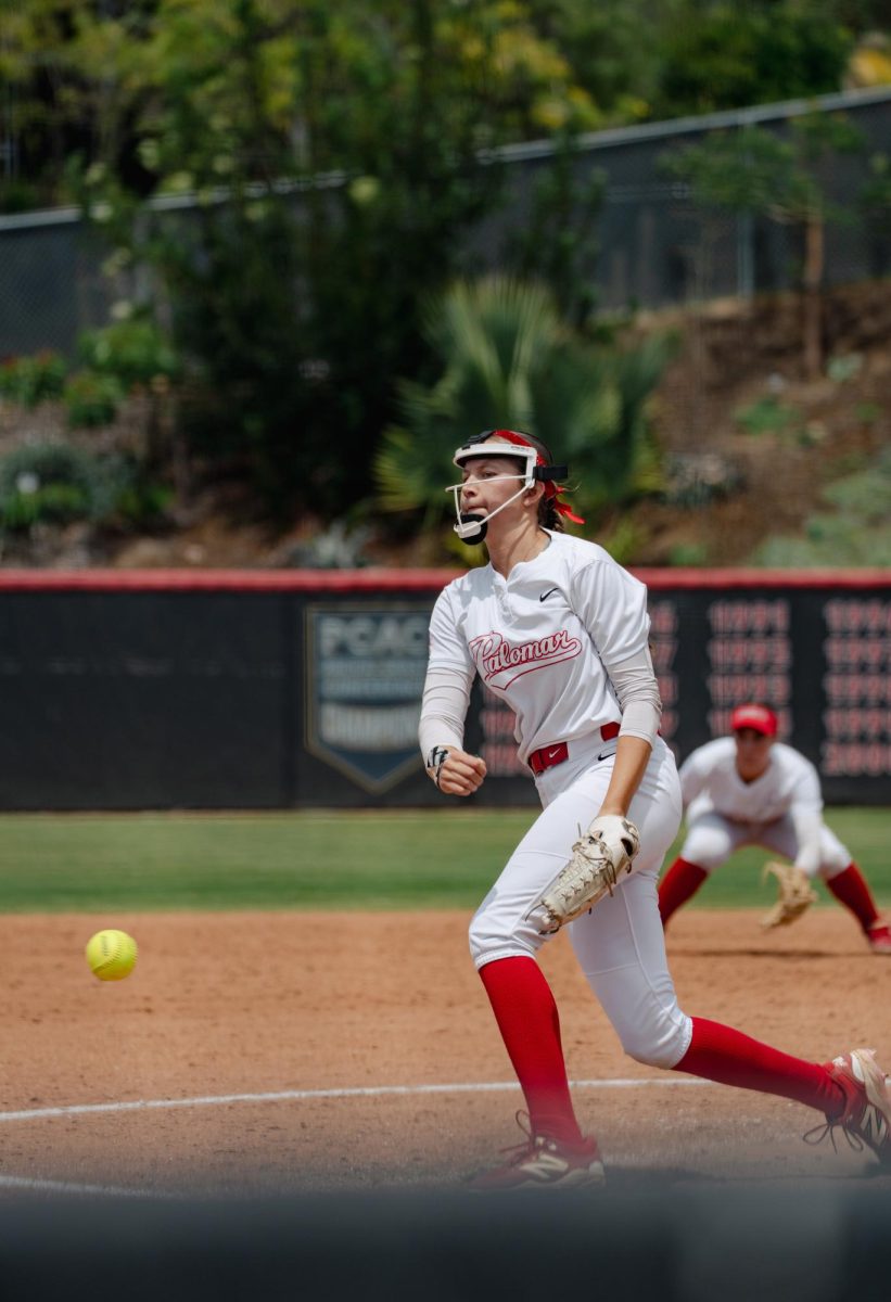 Comet pitcher #11 Gianna Burgin pitching a ball towards Ventura player on May 2.