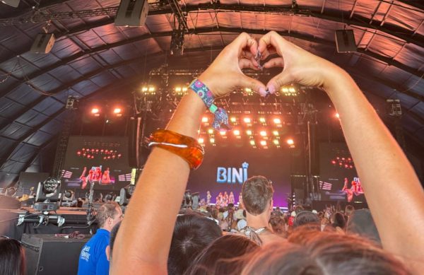 Hands form the shape of a heart at the 2026 Coachella Music Festival. Photo credit: Sienna Alexis
